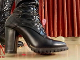 Small balloons pop with high heels boots. FULL